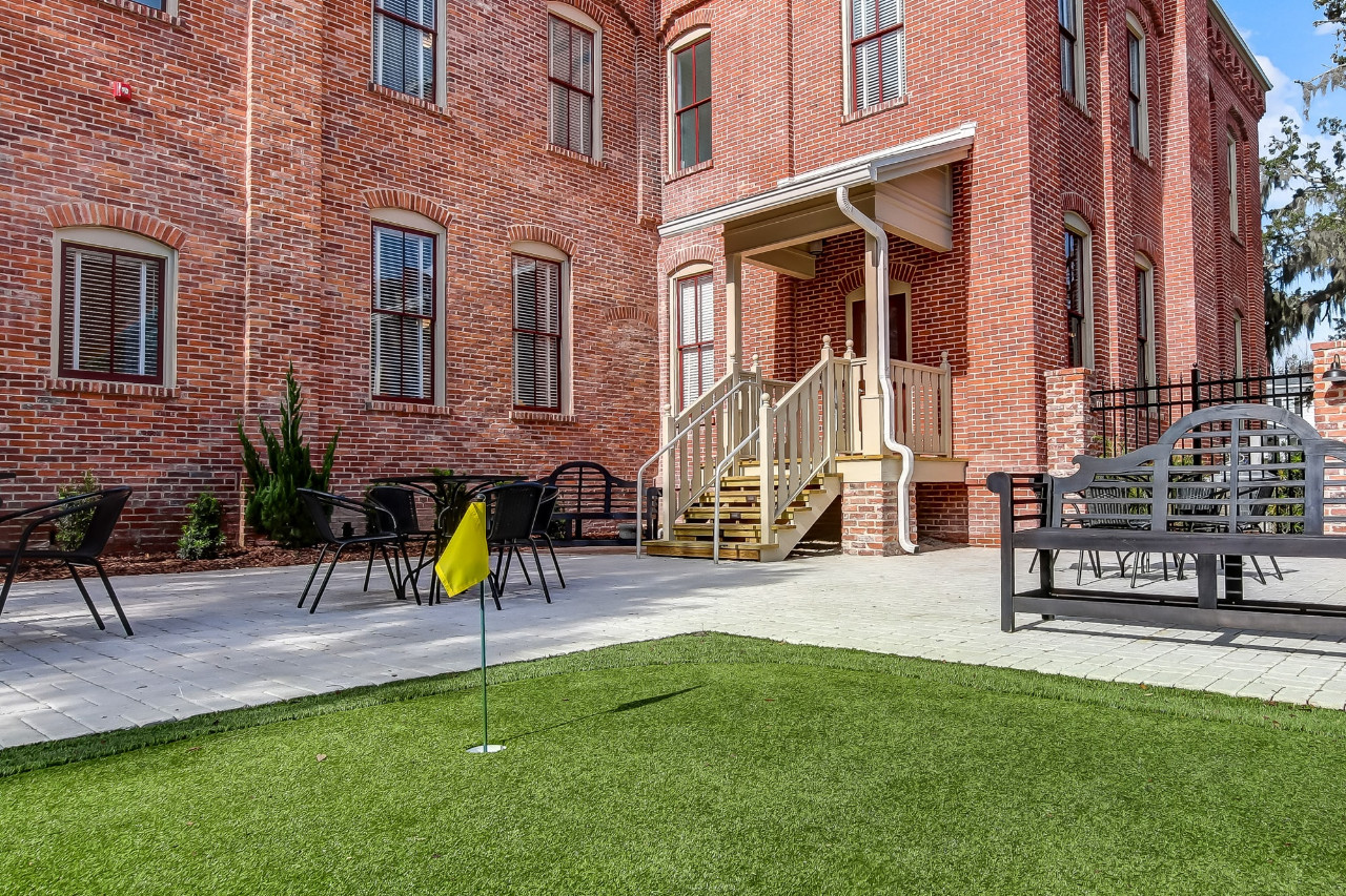 Schoolhouse Courtyard and putting green